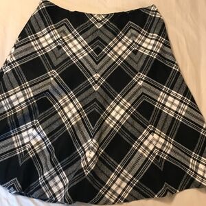 Banana Republic plaid skirt. Fit and Flare style size 12. Acrylic and Wool Blend